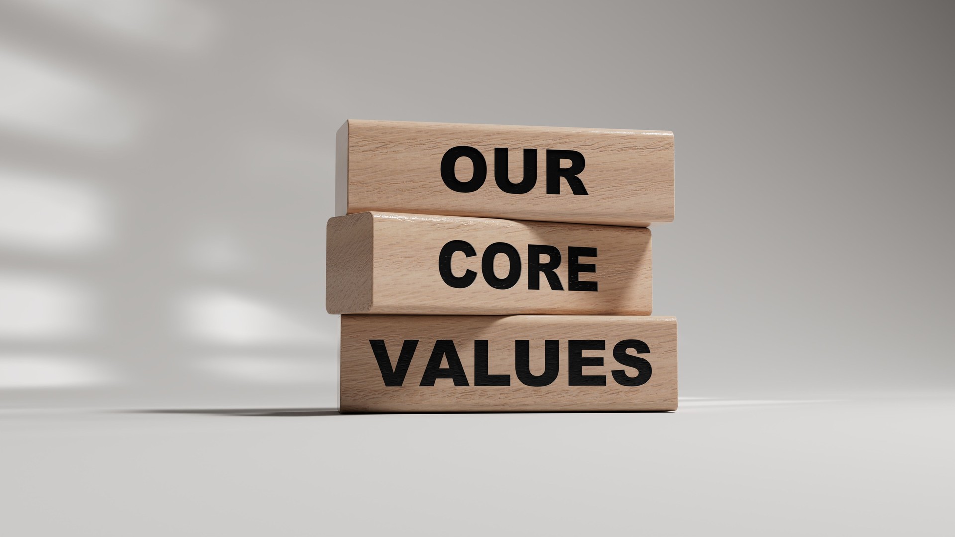 Our core values symbol. Concept words Our core values on wooden blocks.Business and Our core values concept. Copy space.3D rendering on white background.